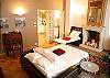 Extra Sleeping Layout - The sofa folds out to sleep 2 guests in a double bed and the footstool extends into a single bed.  The max occupancy for sleeping guests is 5 adults and/or children.