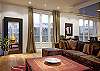 The sofa forms the primary gathering point in the Great Room. There are 2 comfortable chairs (see one in the mirror) which can also be included to seat even more comfortably.  2 children or 1 adult and can also sleep on the sofa for a maximum occupancy of 4 guests for the townhouse.
