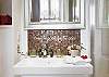 Sweet arrangements and details make this Paris apartment a gem