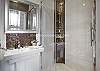 Full size shower, immaculate white tile, perfect design details