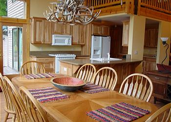 Gourmet Kitchen and Dining Table at Rapid River Retreat
