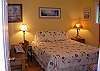 bedroom w/ queen
