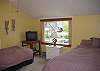 bedroom w/ queen and twin beds