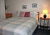 bedroom w/ queen