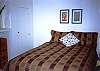 bedroom w/ queen