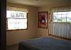 downstairs bedroom w/ queen bed