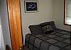 bedroom w/ queen bed