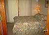 bedroom w/ queen bed