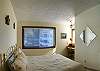 bedroom w/ queen bed