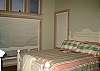 master bedroom w/ queen bedroom and private bath