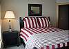 bedroom w/ queen