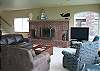 living room w/ flat panel TV