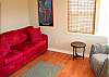 TV room and guest bedroom with privacy pocket doors
