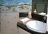 There are custom bathrooms on every level.