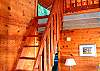 The darling loft overlooks everything, has 2 twin beds and a large skylight.