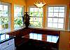 The kitchen also has a sweet breakfast nook
