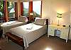The "twin' room has an attached jack and jill bathroom