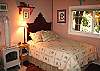 Cozy queen bed..every window looks out to the redwoods...