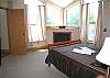 The Master Suite is spacious with ocean views, gas/log fireplace and private bath...your own, personal sanctuary...