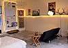 The game room, pool table, datrs, TV, Ipod doc..