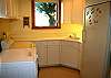 even the laundry room has bragging rights...large second freezer, utility sink, and even a shower to wash off the kids atfter a day at the beach.