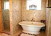 the soaking tub and huge walk-in shower..