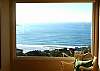 This 3-story beach home is beautifully decorated and has  endless views from the living/dining area and downstairs family room. Charming reading area throughout!