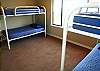The bunk room is a great kids room and is next to the lower floor game room.