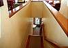 downstairs opend to a patio, sitting area, 3 bedrooms and 3 baths.