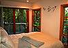 The downstairs bedroom has views of the forrest, gas/log fireplace, and private bath with tub...Also small sitting deck, reading chair and HDTV with DVD player.
