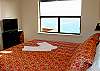 The Master bedroom has outstanding views and a large, private bath.