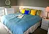The Master bedroom has ocean views and a private bath.