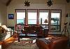 The living room has vaulted ceilings...and grand views...