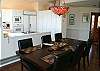 The dining room opens to the kitchen and the deck...