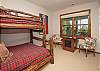 Bedroom with TV 

Bed Configuration:
Main Bedroom - King Bed
2nd Bedroom - King Bed
3rd Bedroom - King Bed
4th Bedroom - Full and Twin Beds