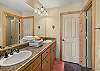 master bathroom with shower and walk-in closet. There are two trundle beds available as well