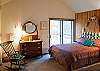 Loft Queen Master Bedroom with it's own private balcony, full bathroom and a walk-in closet.