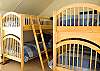 Great kids room with two sets of bunk beds.