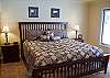 Very cozy King Master Bedroom.