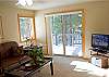 Great flat screen TV and balcony in upstairs loft family room.