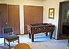 Another view of the loft with a foosball table.