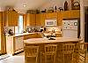 Prepare yourself for the smell of fresh coffee and breakfast in this fully equipped kitchen complete with breakfast bar.