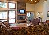 Spacious living room and open to the kitchen and dining room.
