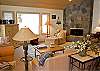 Grab a blanket and a good book and enjoy the fireplace and forested view.  Has larger screen TV and also ceiling fan.