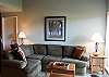Living room.  Comfortable furniture and tastefully decorated.
