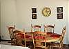 Enjoy a wonderful meal and conversation at this dining room table.