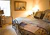 This is one of three downstairs king bedrooms.  This one shares an attached bath with one other king bedroom.