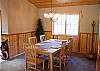 Dinning area seats 6 with additional seating at the breakfast bar for 3.