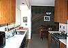 Kitchen is open to dining area.