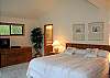 King master suite with vaulted ceilings.